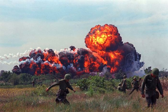 30.) A napalm attack near U.S. troops on patrol in South Vietnam (1966).