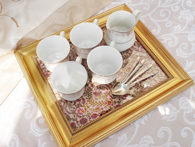 8.) Make a serving tray using an old photo frame.