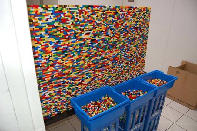 According to NPIRE, they used around 55,000 individual Lego bricks to build the wall. It took them almost a full year to finish building it.