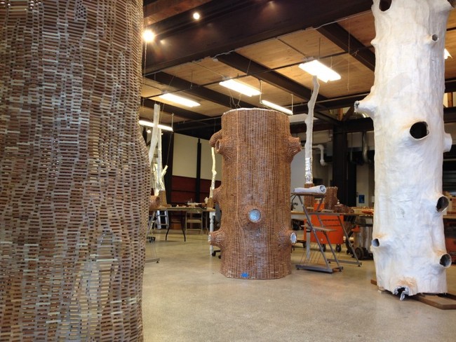 At the studio, volunteers arranged blocks of wood around the casts to form a hollow structure. The casts were removed once the structures were complete. 