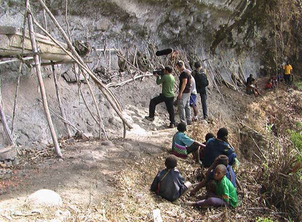 The bodies “are placed in such a way that they look down the mountain and upon the village far below.”