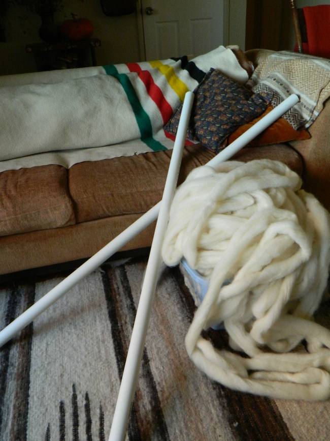 In order to knit the giant strands together, she had to use huge pieces of PVC pipe as knitting needles.