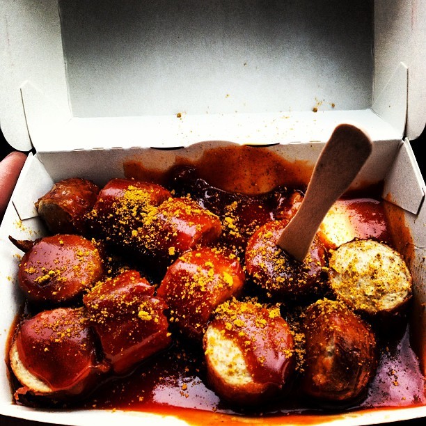 14. The McCurrywurst in Germany includes sliced sausage coverd in tangy tomato sauce and curry powder.