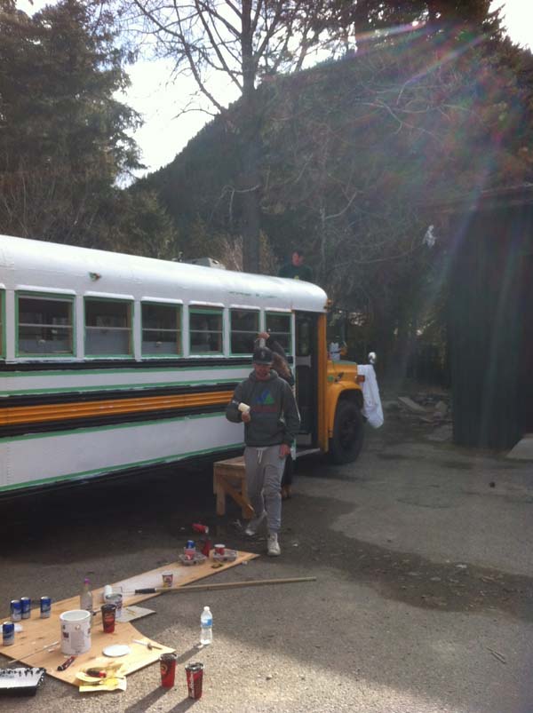 "After much "discussion" we settled on white and green. We used tremclad, which is a metal paint with a rust-proofing ingredient. We did two coats of white and three coats of green for the stripes."