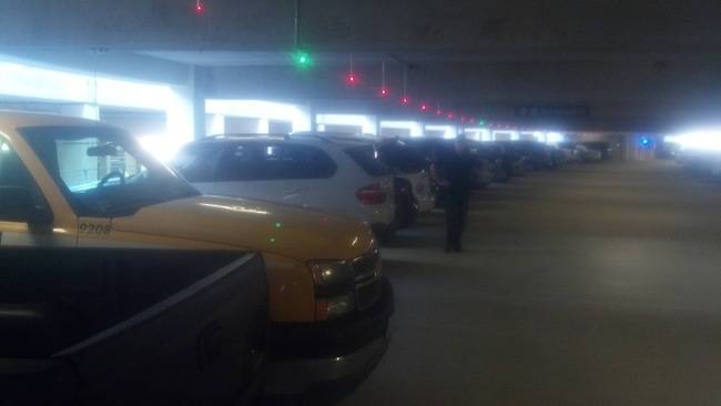 Frantically driving around a parking garage looking for a space is a special kind of torture. These light-signals let would-be-parkers know where there is and isn't a space in any particular row.