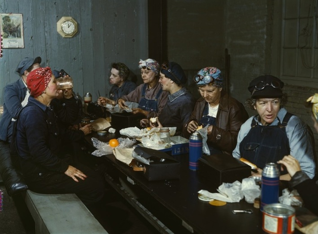 21.) Female railroad workers eating their lunches in 1943.