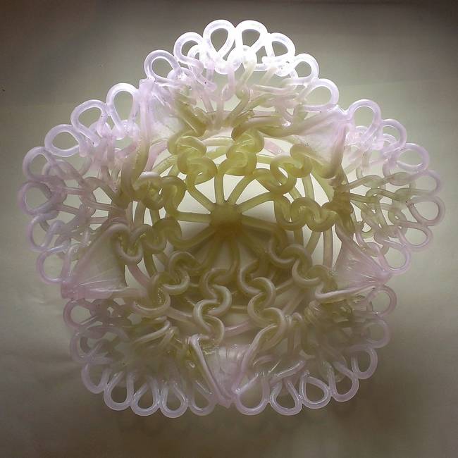 This sculpture takes on the form of a flower.