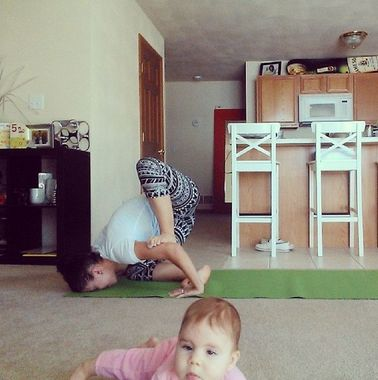 23.) Even her baby can do better yoga than this.