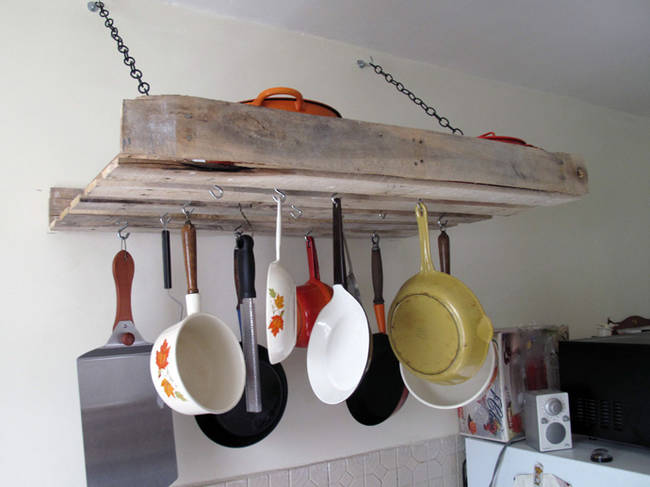 Or, hang your pots and pans overhead for a neat and efficient use of space.