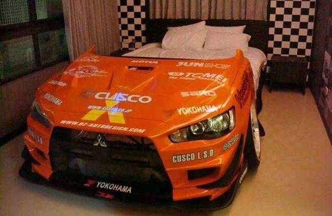 7.) Any NASCAR fan would love a bed made from an old race car.