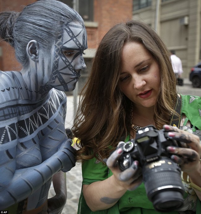 Look at the detail of the painting on her face. Incredible.