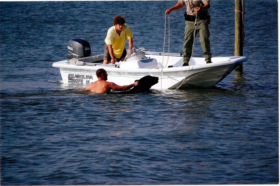 Onlookers were shocked as the 400lb bear could have torn him limb from limb normally.