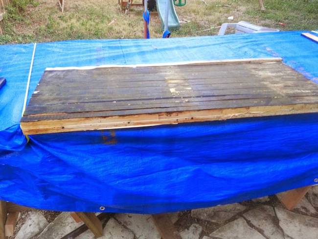 Using another piece of bowling alley wood, he extended the width of the table top.