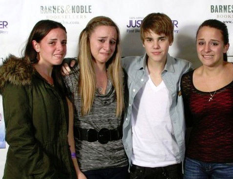 8.) I can't tell if these girls are happy to meet Justin Bieber or horrified.