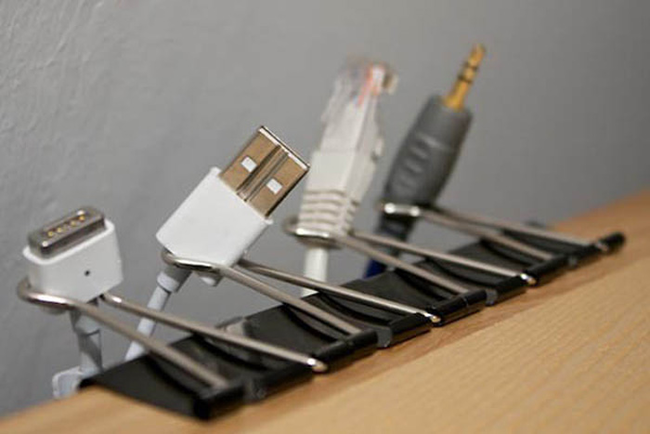 16.) Use binder clips to organize your desk wires.