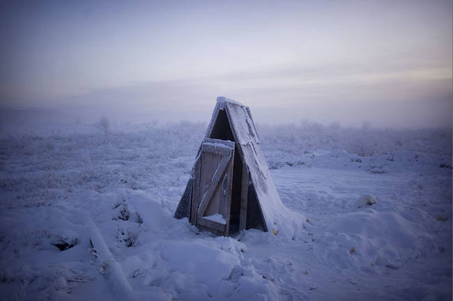 The people of Oymyakon use outhouses because the ground is too frozen to install any sewage system.