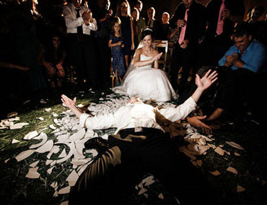 From sawing logs to breaking plates, those German couples sure know how to throw a weird wedding.