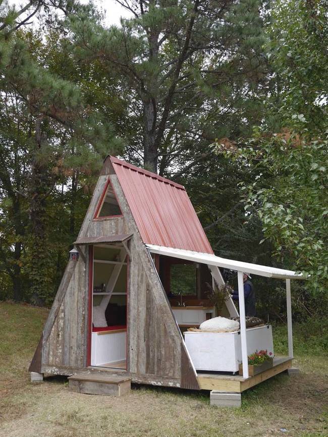 This tiny A-frame house was designed by David Stiles and cost only $1,200 to build.