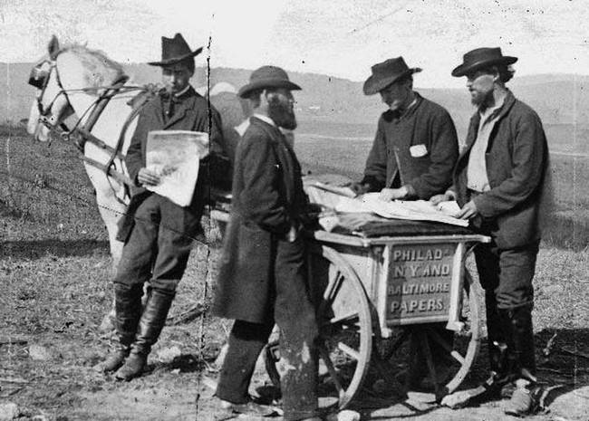 8.) A newspaper vendor at a Union camp in Virginia during the Civil War in 1863.