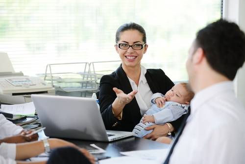 "My clients love when I bring the baby to meetings.  My severe bun lets them know I mean business."