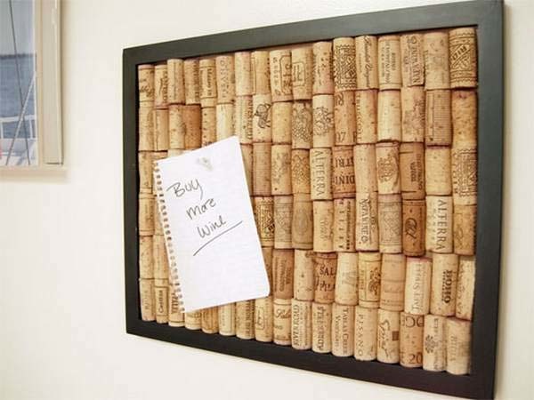 4.) Hot glue old corks to a piece of wood to make a super cute bulletin board (and use up all of those wine corks).