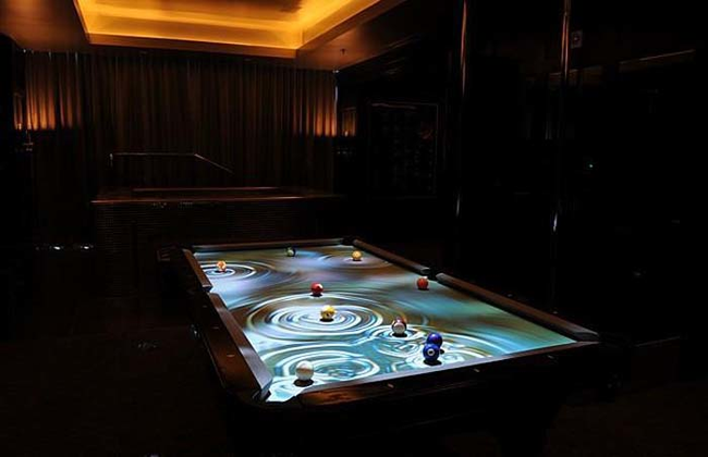 8.) $25,000 - Obscura CueLight Interactive Pool Table.