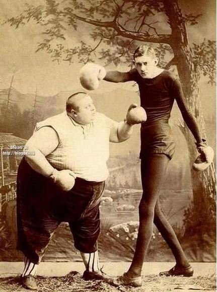 13.) I don't know, the guy on the right has a longer reach, but the guy on the left looks like he has more power.