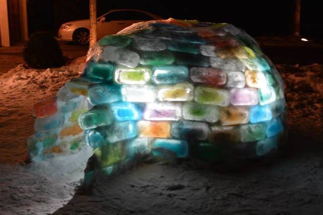 This igloo builder dyed the ice blocks with food coloring. When lit from the inside, the beauty of the colorful blocks is highlighted.