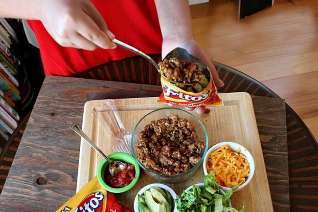 5.) Instead of making traditional tacos, create your own to-go taco salad by putting taco fixings in a bag of Fritos.