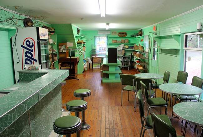 The cafe section today, with the same countertops (we assume) and a pretty wonderful mint green interior.