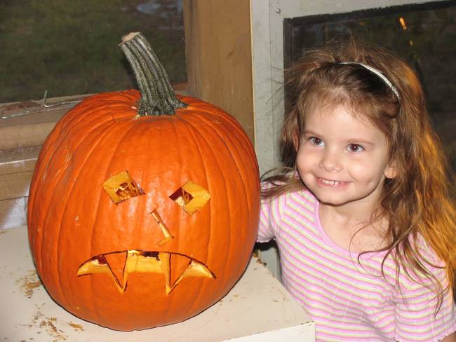 10.) Let kids design the jack-o-lantern, but carving with the big heavy knife is your job.