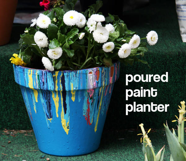 4.) All you need to make this poured paint planter is acrylic paint and a terra-cotta pot.