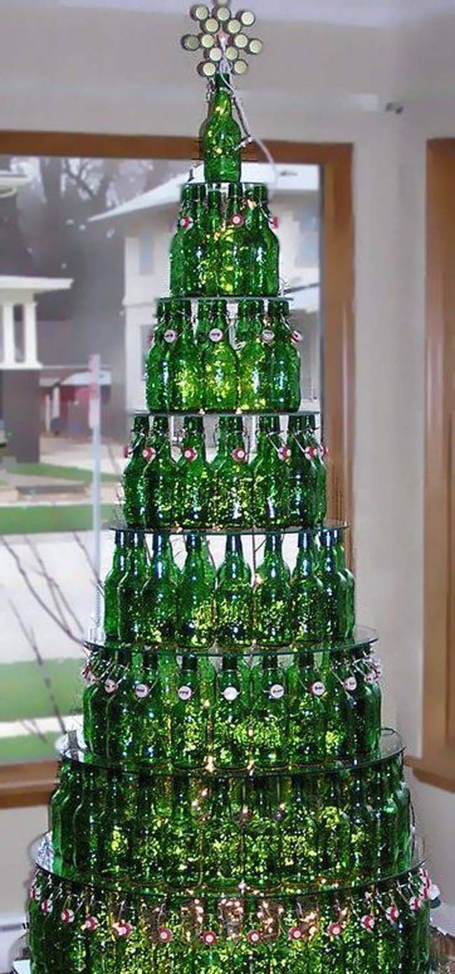 Instead of sending your colored glass bottles to the recycling bin, stack them into an evergreen tree.