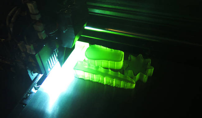 The shapes for the popsicles are printed using an Object Connex 500 3D printer, and were designed with Rhinoceros CAD software. Several pieces are combined to get the shape of one popsicle.