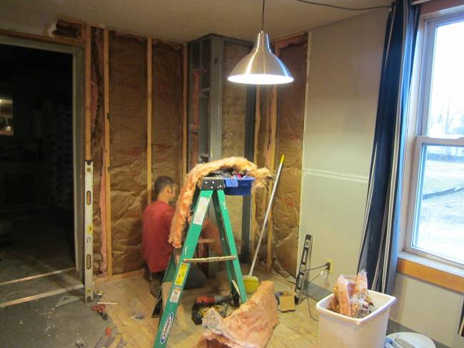 He began by tearing out the drywall and replacing the insulation.