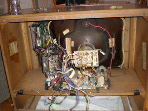 First the builder had to gut the TV. For an older TV like this, it's a relatively simple process.