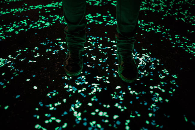 The path is covered with special solar paint that absorbs energy during the day, and glow at night, as well as LEDs that are powered by a nearby solar array.