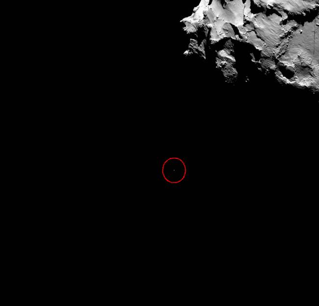 <i>Philae</i>, seen here as a tiny dot circled in red, descents to the comet's surface.