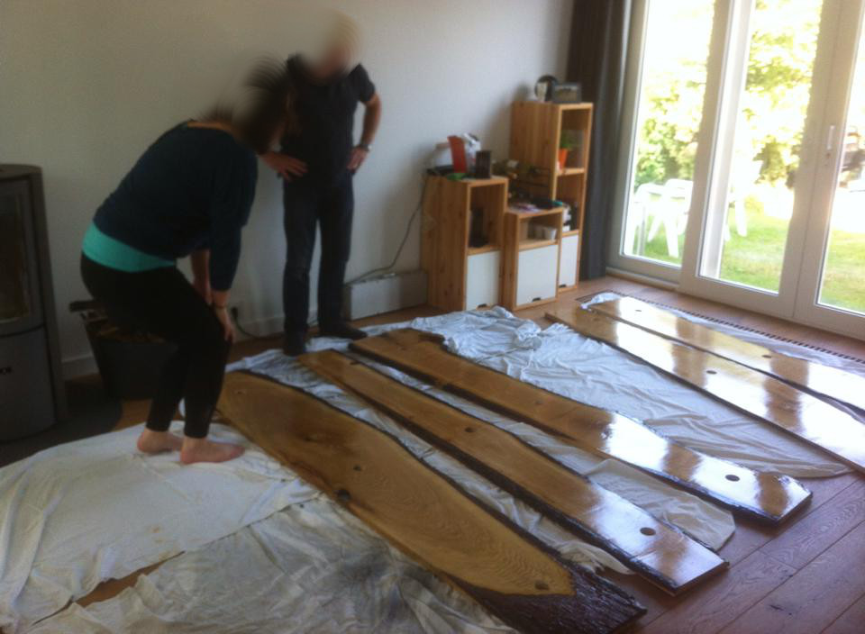 Arranging the planks: they wanted as much bark viewable from the front as possible.