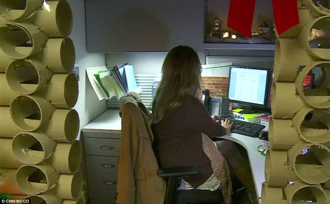 In the end, her log cabin fit her entire cubicle while not taking up anyone else's office space.