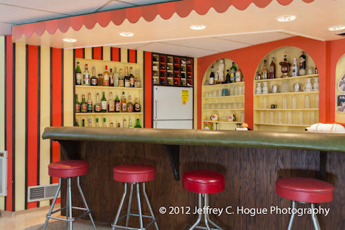 Not only do you get a beauty parlor, you also get...this. It's a bar, although it looks more like a candy shop. And it certainly doesn't look like anything that would be found in a house