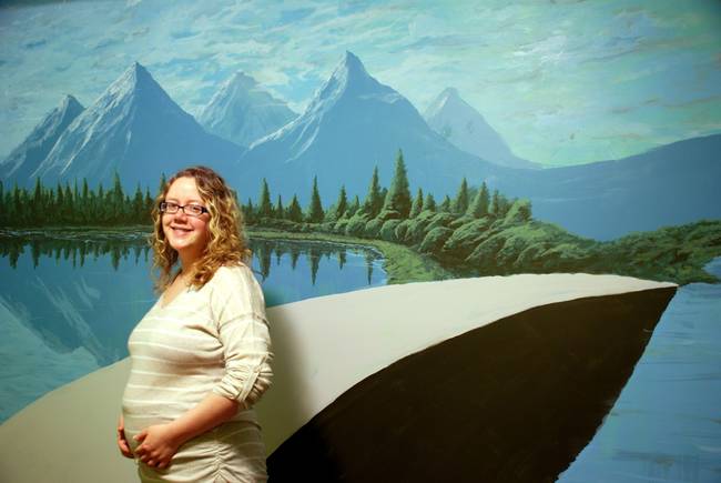 While his wife (below) was still pregnant, the soon-to-be dad decided he was going to create a mural for their son.