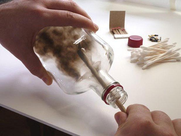 Jim uses candle smoke to paint picture-perfect images on the inside of empty bottles.