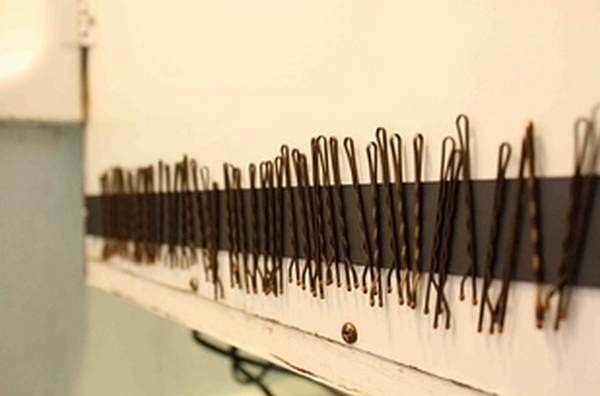 1.) Attach a magnetic strip to the bathroom wall so that your bobby pins can stay in one place.