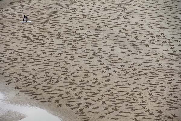 They etched bodies into the sand.