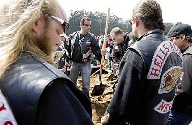 Harry “The Horse” Flamburis was the former president of the Daly City California Hells Angels club. A month after his original burial, his Angel brothers returned to bury his chopper along with him.