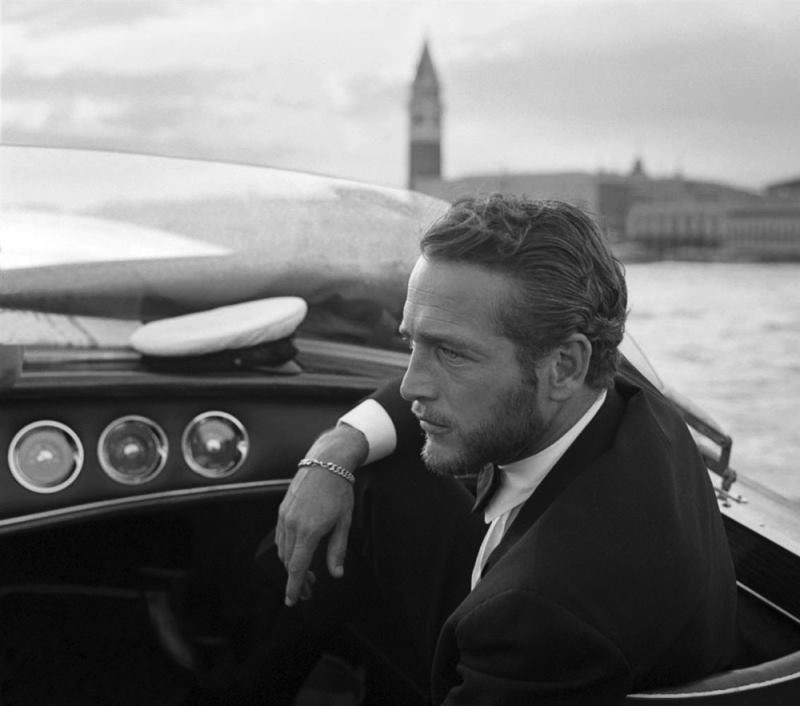 6 time Golden Globe winner Paul Newman boating in Venice during a film festival (1963).