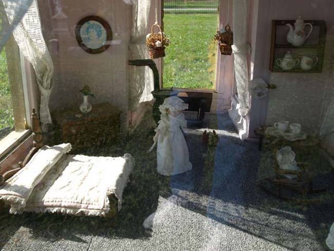 Vivian also died at just 5 years old in 1899. Her family built this elaborate dollhouse to mark her grave site in the Connerville City Cemetery in Connersville, Indiana.