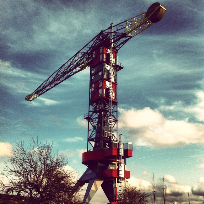 Faralda NDSM Crane Hotel in Amsterdam as seen from the ground.