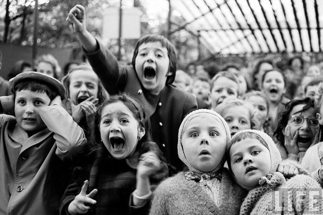 11. Awe - Children here love puppet shows, even in 1963 Paris. I wonder if Miss Piggy is there?